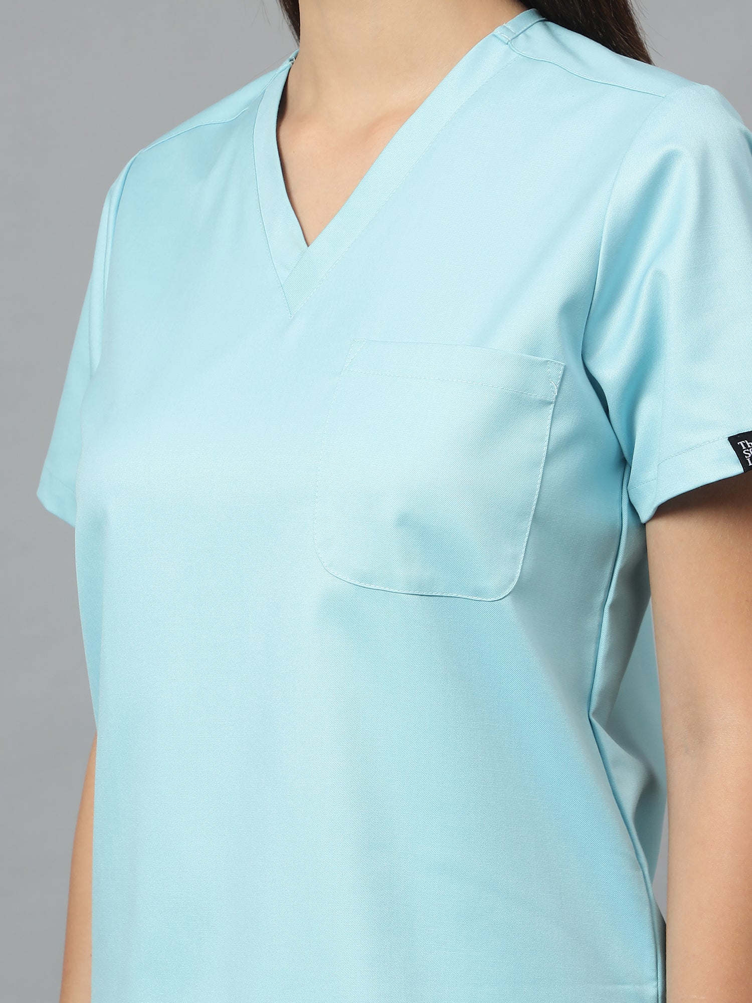 Stretchable (2Way) Women Aqua Blue V-Neck With Straight Pant Scrub Set - Image 3
