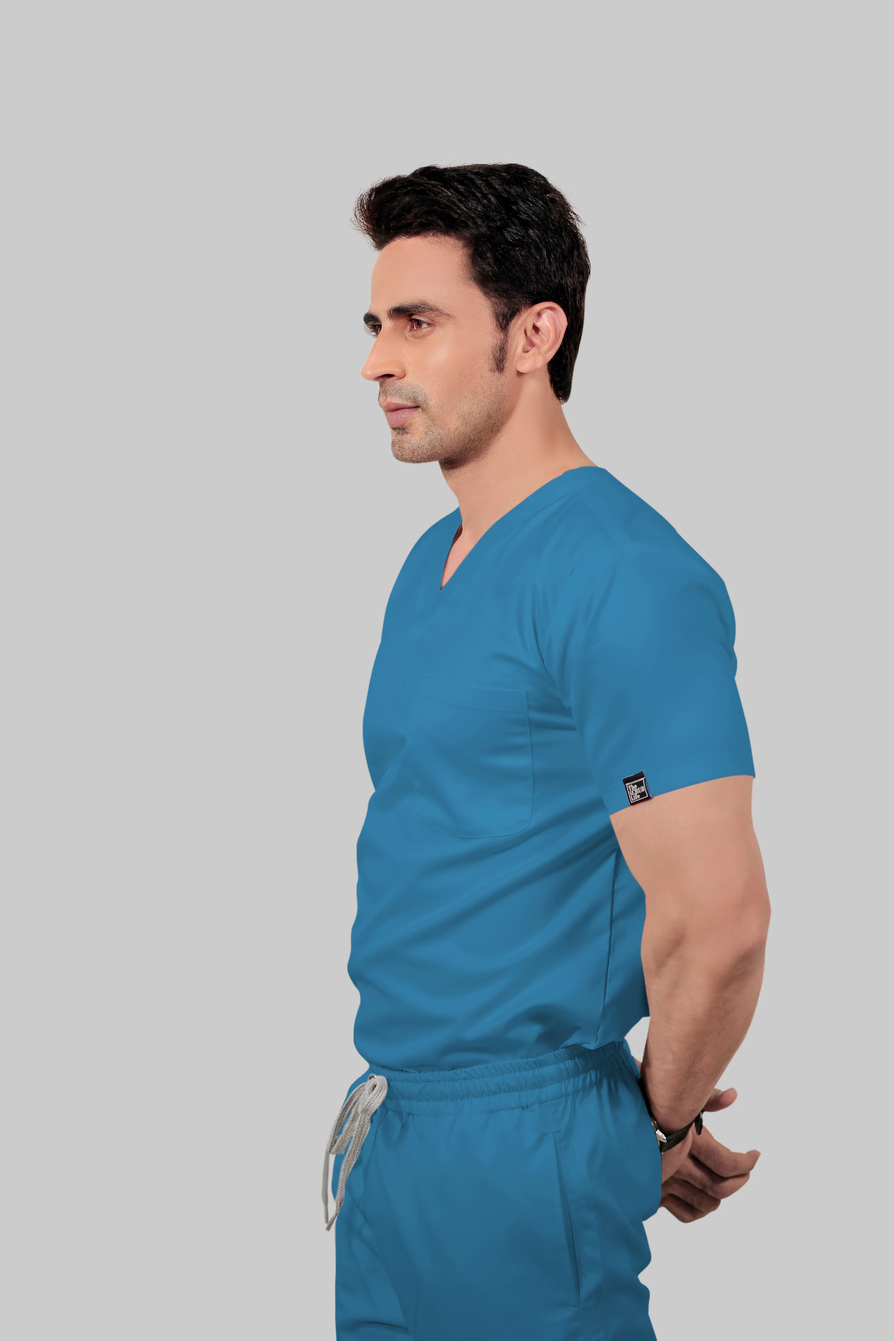 Stretchable (2Way) Men Peacock Blue V-Neck With Straight Pant Scrub Set - Image 4