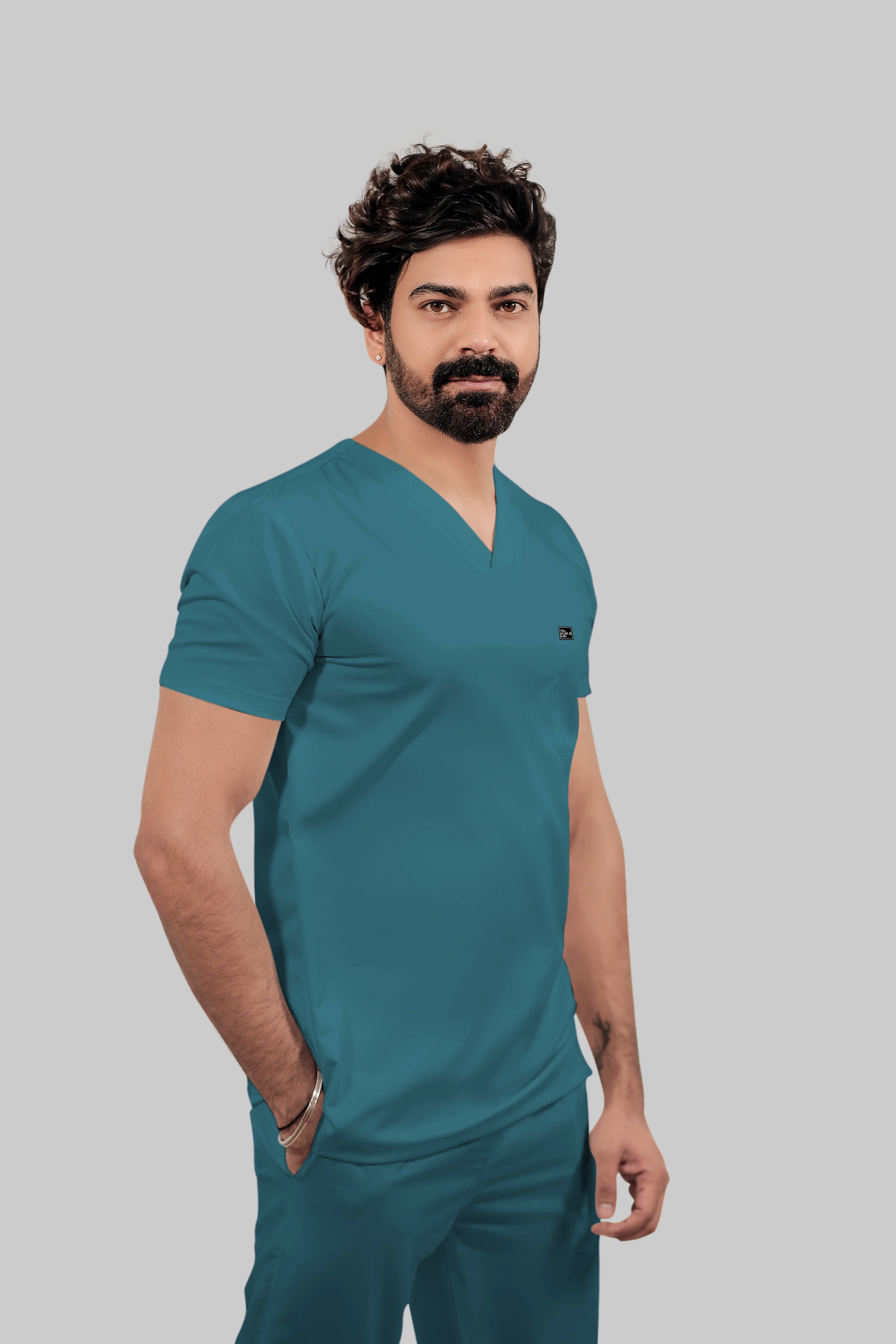 Stretchable (4Way) Men Peacock Blue V-Neck With Straight Pant Scrub Set - Image 3