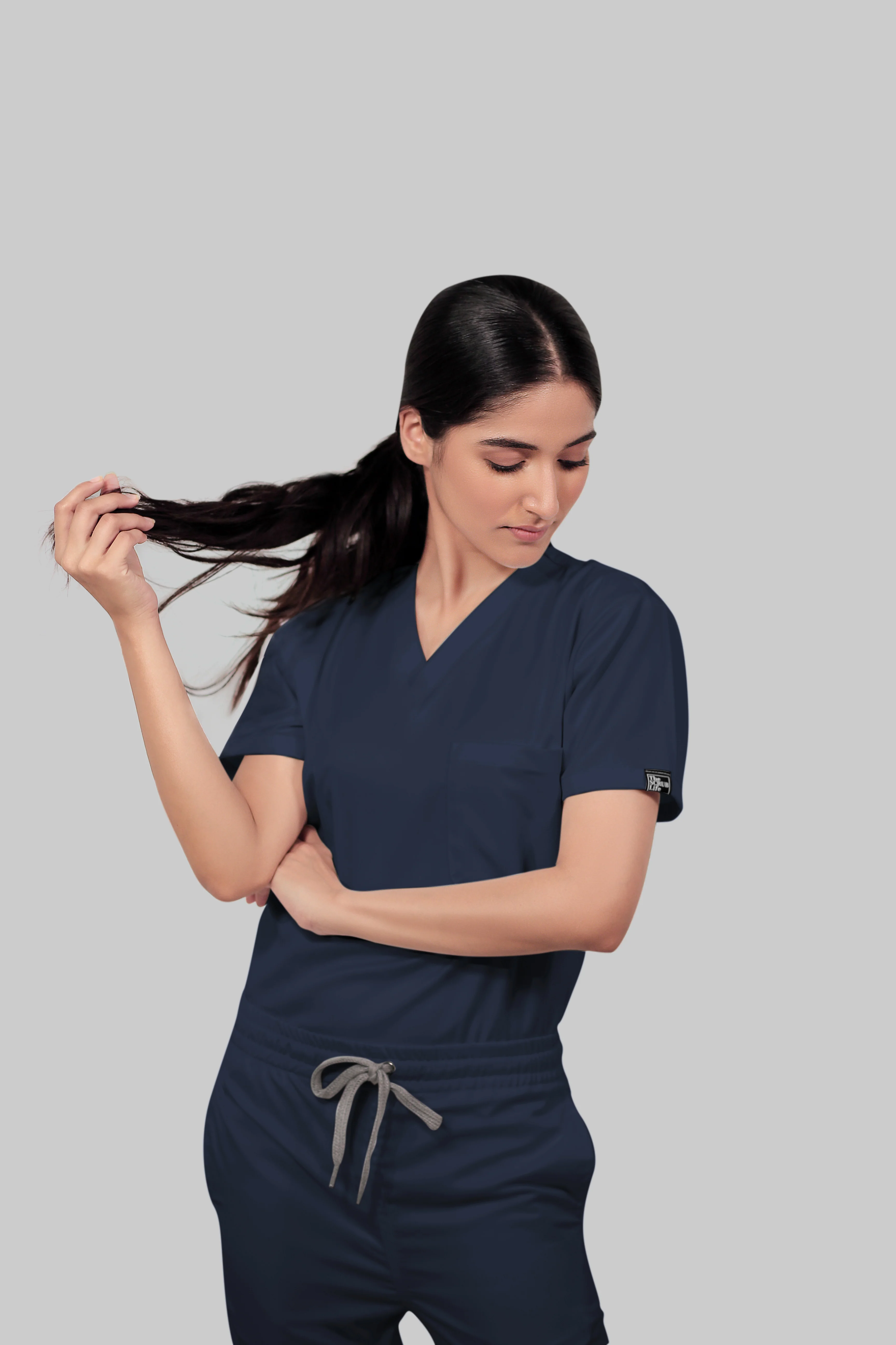 Stretchable (4Way) Women Navy Blue V-Neck With Straight Pant Scrub Set - Image 3