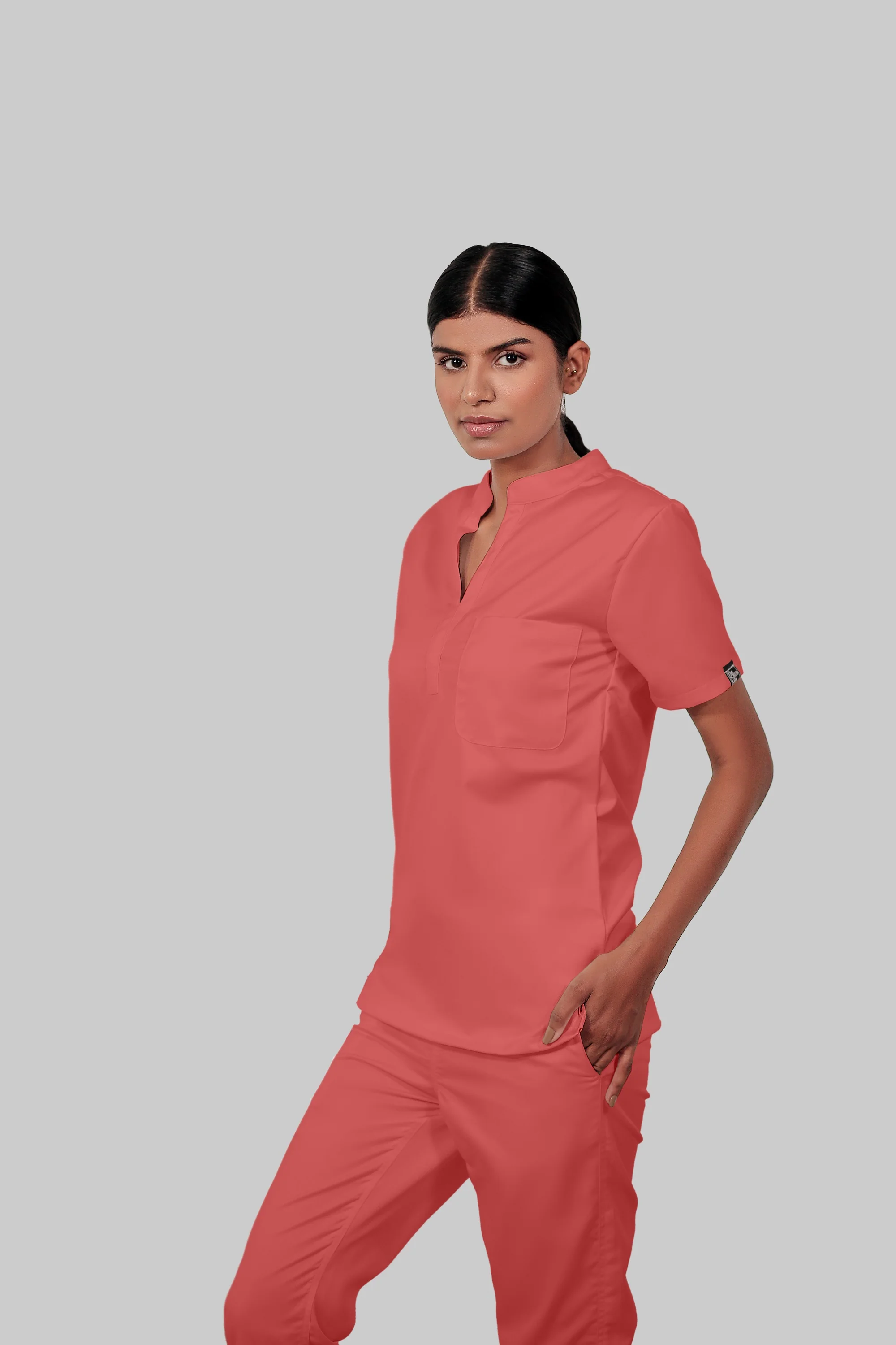 Stretchable (2Way) Women Peach Mandarin Neck With Jogger Scrub Set - Image 3