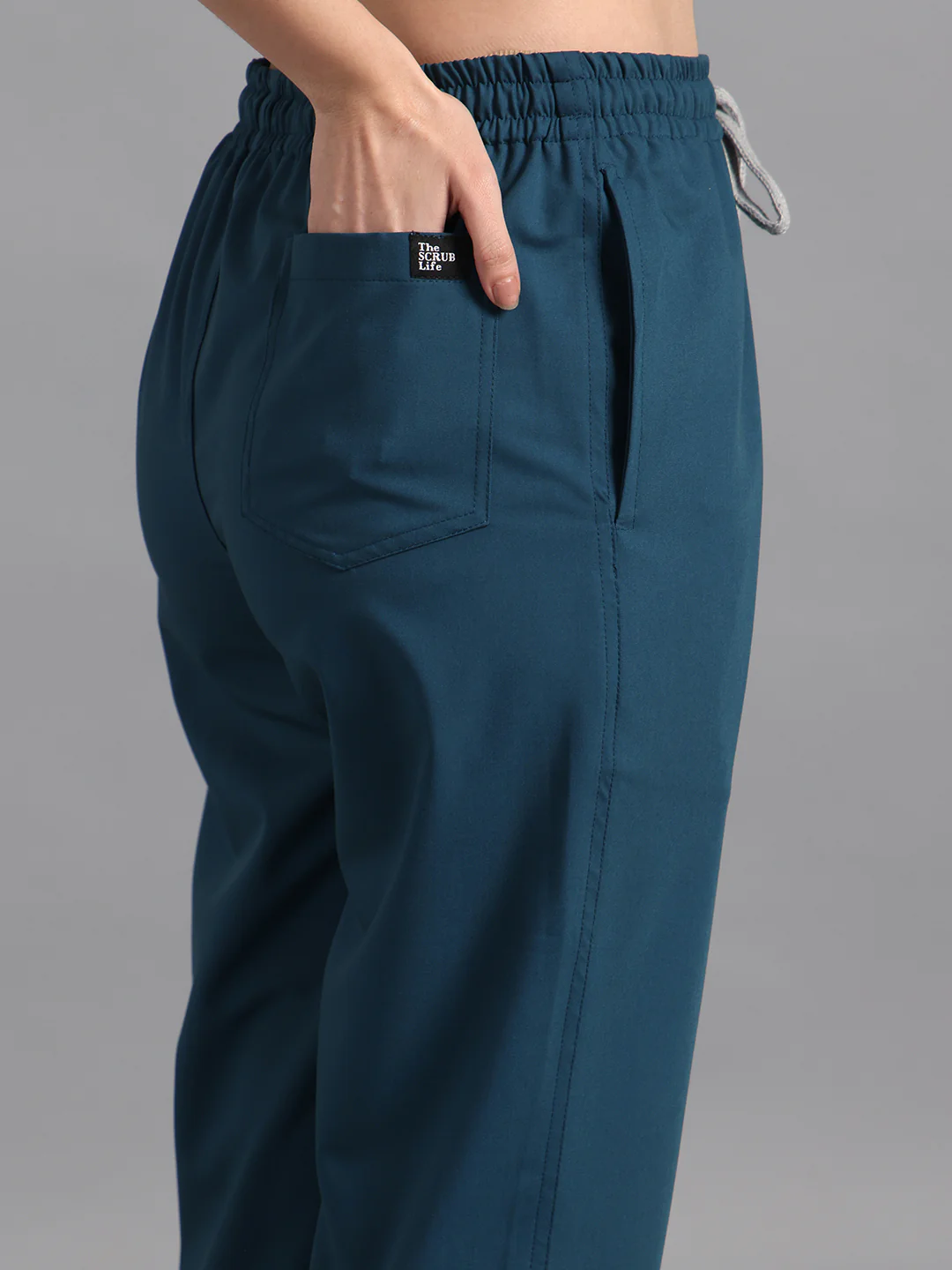 Stretchable (4Way) Peacock Blue Women Flex Zip Neckline Top With Straight Pants - Image 6